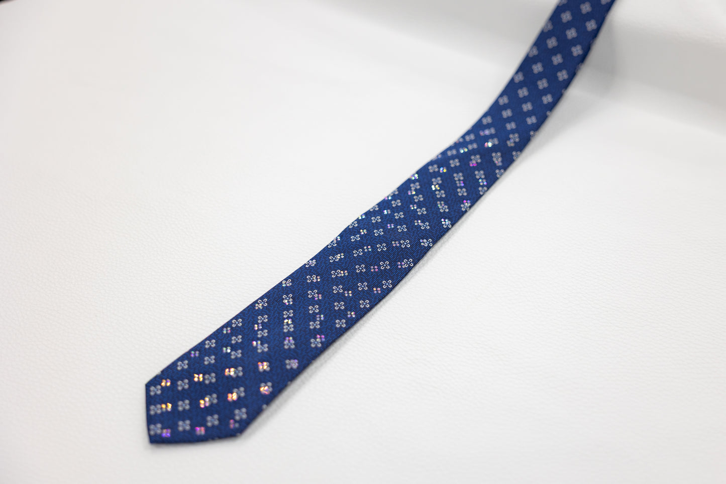 Navy Blue Silk Tie with Diagonal Floral Dot Patterns